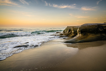 colorful sunrise over windansea beach in san diego, california