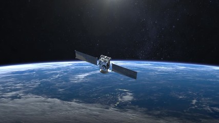 flying satellite. the satellite appears in the frame and quickly flies away. the earth is spinning r
