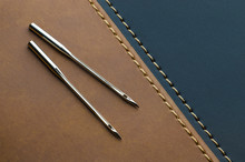 Sewing Machine Needles For Leather On Dark Brown Leather Stitched With Black Leather Using Yellow Thread