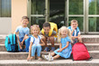 © Africa Studio - Children sitting on stairs of kindergarten