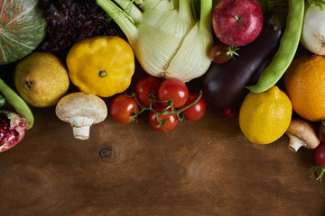 Fresh raw vegetables on wooden background copy space for text. Design moce up