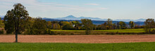 Landscape Of Countryside On Grand Isle, One Of The Lake Champlain Islands With Green Mountains Of Vermont Across The Lake
