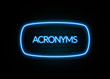 © zobaair - Acronyms  - colorful Neon Sign on brickwall