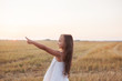 © 4frame group - Little beautiful smiling girl on a gold wheat field walking at sunset. Happy five years old girl smiling and laughing in summer day at nature. Happyness freedom and carefree childhood concept