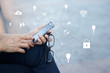 © ipopba - Man using mobile payments online shopping and icon customer network connection on screen, m-banking and omni channel