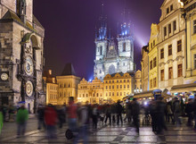 Night View Of The Staromestske Square In Prague. Týnsky Church And Prague Astronomical Clock