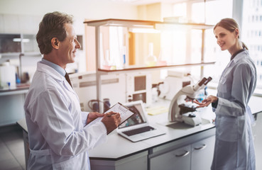 Wall Mural - laboratory scientists working