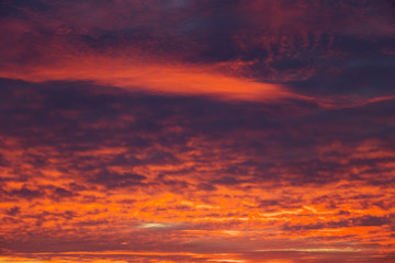 Fiery, orange and red colors sunset sky. Beautiful background