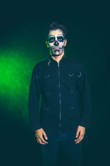 Wall Mural - scary halloween skeleton man in jacket stud