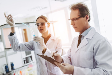 Wall Mural - laboratory scientists working