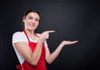 © Catalin Pop - Cheerful successful employee holding something in her palm