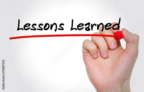 Cuadros en Lienzo Hand writing inscription LESSONS LEARNED with marker, concept