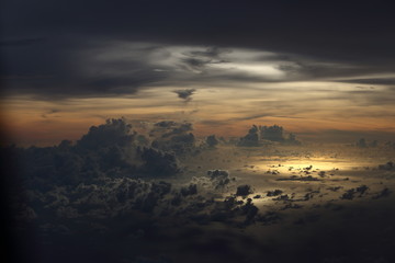 Wall Mural - Sunset White Cloud sky at high level attitude, view from window airplane