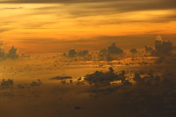 Wall Mural - Sunset White Cloud sky at high level attitude, view from window airplane