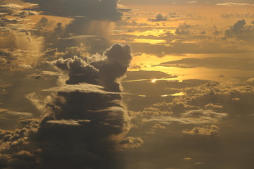 Wall Mural - Sunset White Cloud sky at high level attitude, view from window airplane