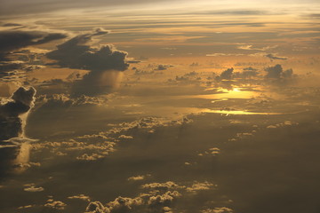 Wall Mural - Sunset White Cloud sky at high level attitude, view from window airplane