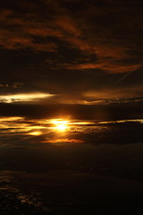 Wall Mural - Sunset White Cloud sky at high level attitude, view from window airplane