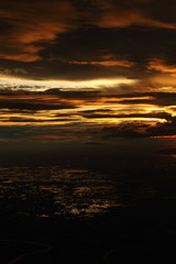 Wall Mural - Sunset White Cloud sky at high level attitude, view from window airplane