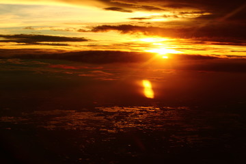 Wall Mural - Sunset White Cloud sky at high level attitude, view from window airplane