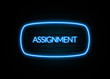 Assignment  - colorful Neon Sign on brickwall