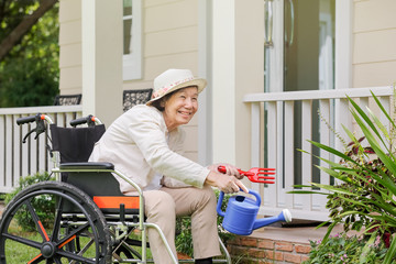 Elderly woman relax with gardening in backyard