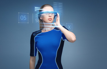 Wall Mural - woman in virtual reality 3d glasses with charts