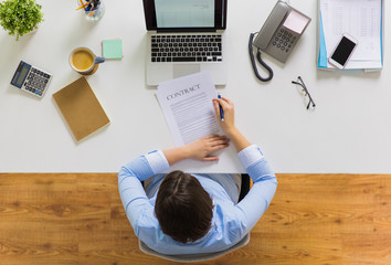 Sticker - businesswoman signing contract document at office