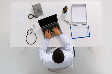 Sticker - doctor with cardiogram and laptop at clinic