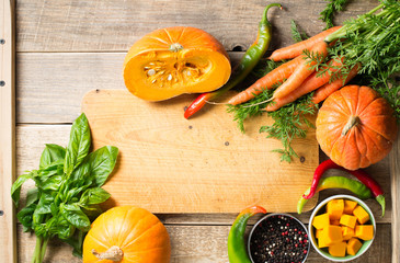 Wall Mural - Group of vegetables over wooden texture