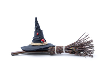 Wall Mural - Magic Broom and Witch Hat on a White Background