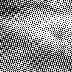 Fototapete - Vector abstract dotted background. Black and white halftone effect vector illustration.