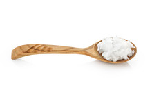Wooden Spoon With Coconut Oil Isolated On White Background.