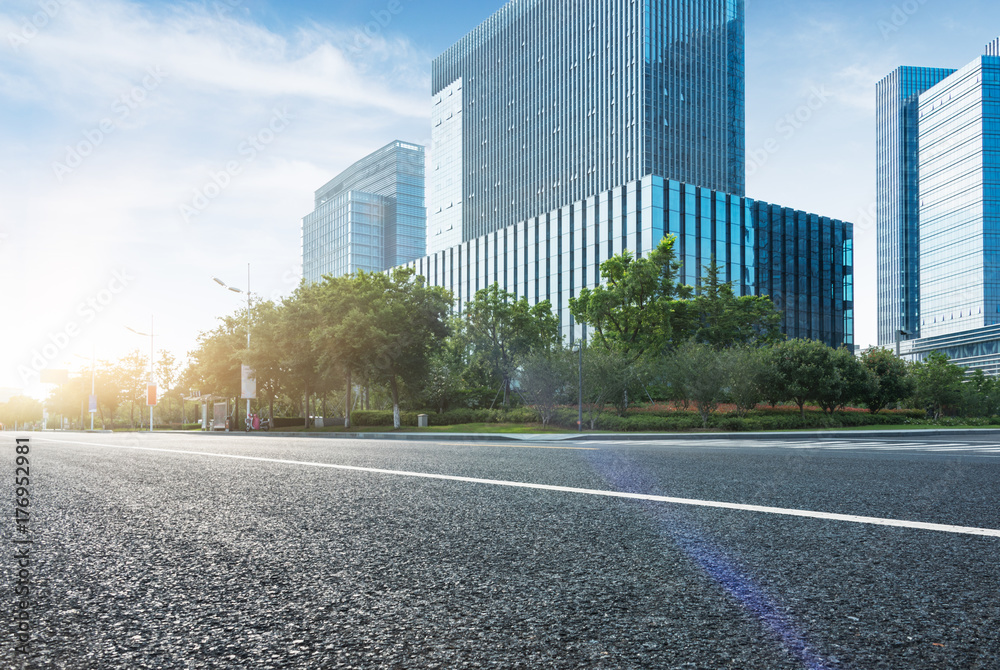 empty road with modern buildings on background,shanghai,china. - obrazy, fototapety, plakaty 
