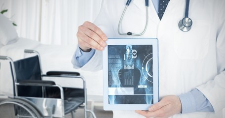 Poster - Composite image of doctor showing a digital tablet