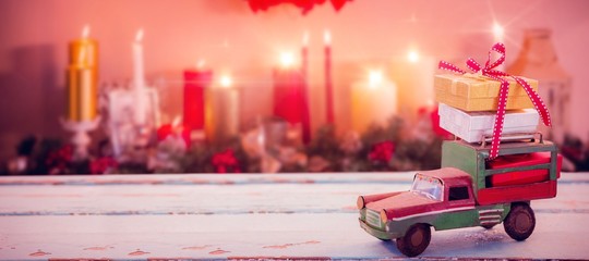Poster - Composite image of car toy on wooden surface