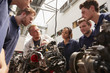 © Monkey Business - Mechanic showing engines to apprentices, low angle