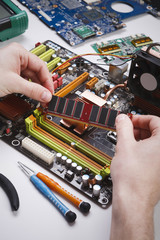 Poster - Technician plug in microprocessor to motherboard