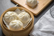 chinese steamed buns on wood container , selective focus
