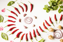 Abstract Food Art-chili, Mint, Basil, Onion, Garlic Arranging On White Background.