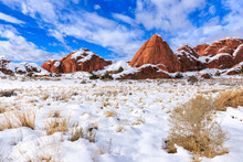 Snow Covers The Red Desert Landscape Of Arches National Park, Utah