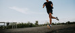 © sutadimages - Young man running on a rural road during between the summer on vacation, run for health according nature, Early in the morning.