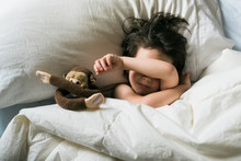 Little Boy And Stuffed Animal Monkey Cover Their Eyes