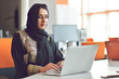 © FS-Stock - Muslim asian woman working in office with laptop