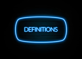 Wall Mural - Definitions  - colorful Neon Sign on brickwall