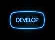 Develop  - colorful Neon Sign on brickwall