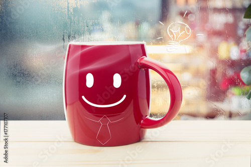 Red Mug Of Coffee With A Happy Smile Steaming Red Coffee Cup On A