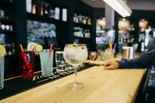 Man With Cocktail At Counter