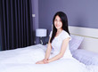 © geargodz - beautiful woman on bed in bedroom