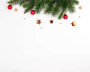 christmas frame greeting card. brushing a branch of a christmas tree on a white background with red 