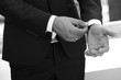 © dyageleva - man adjusts his jacket. Successful in the business.